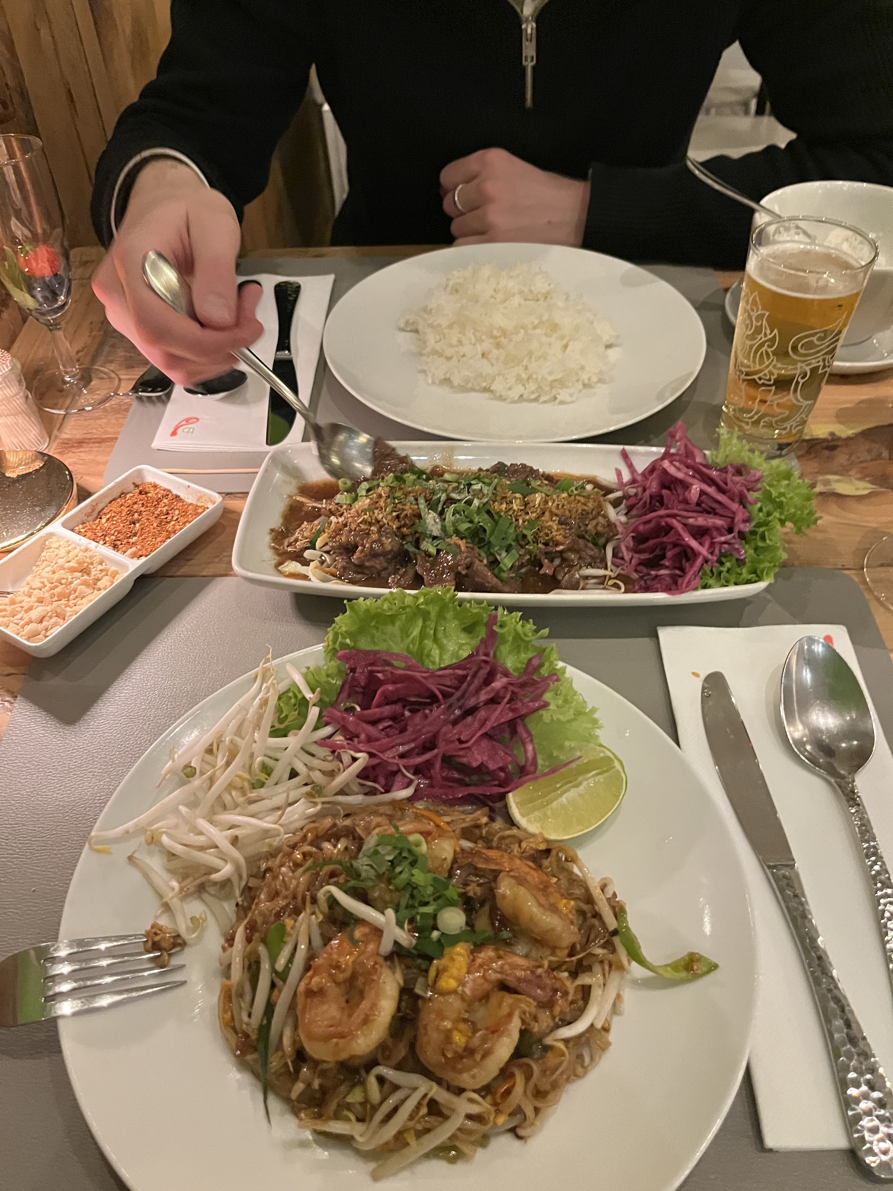 Thai food for two, eating pad Thai and rice in Leeuwarden's, Netherlands restaurant